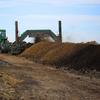 Turning compost at the Chamness Technology Dodge City location.